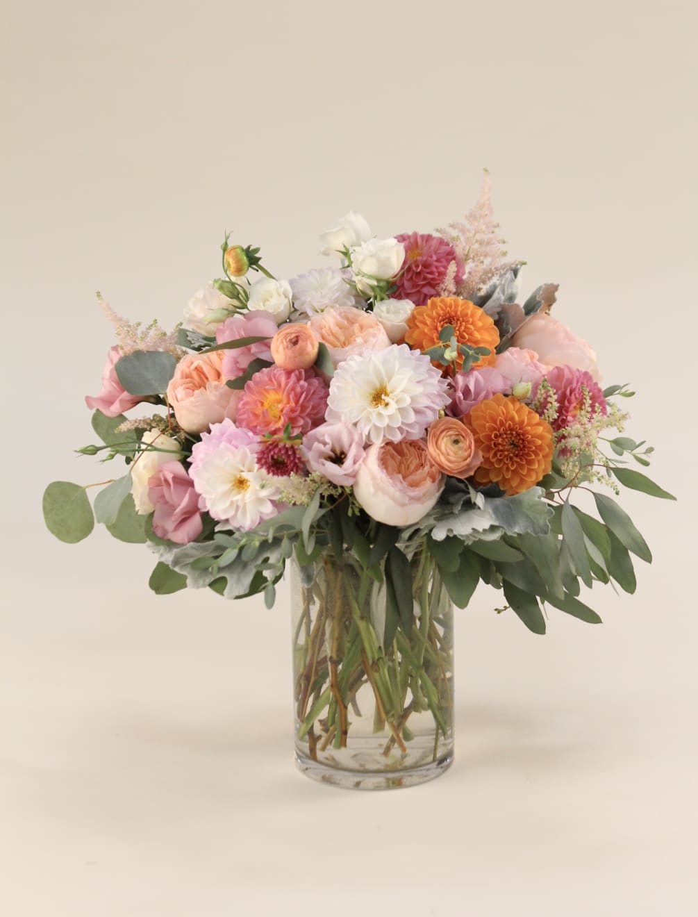 This majestic floral design offers lush summer and fall blooms in an