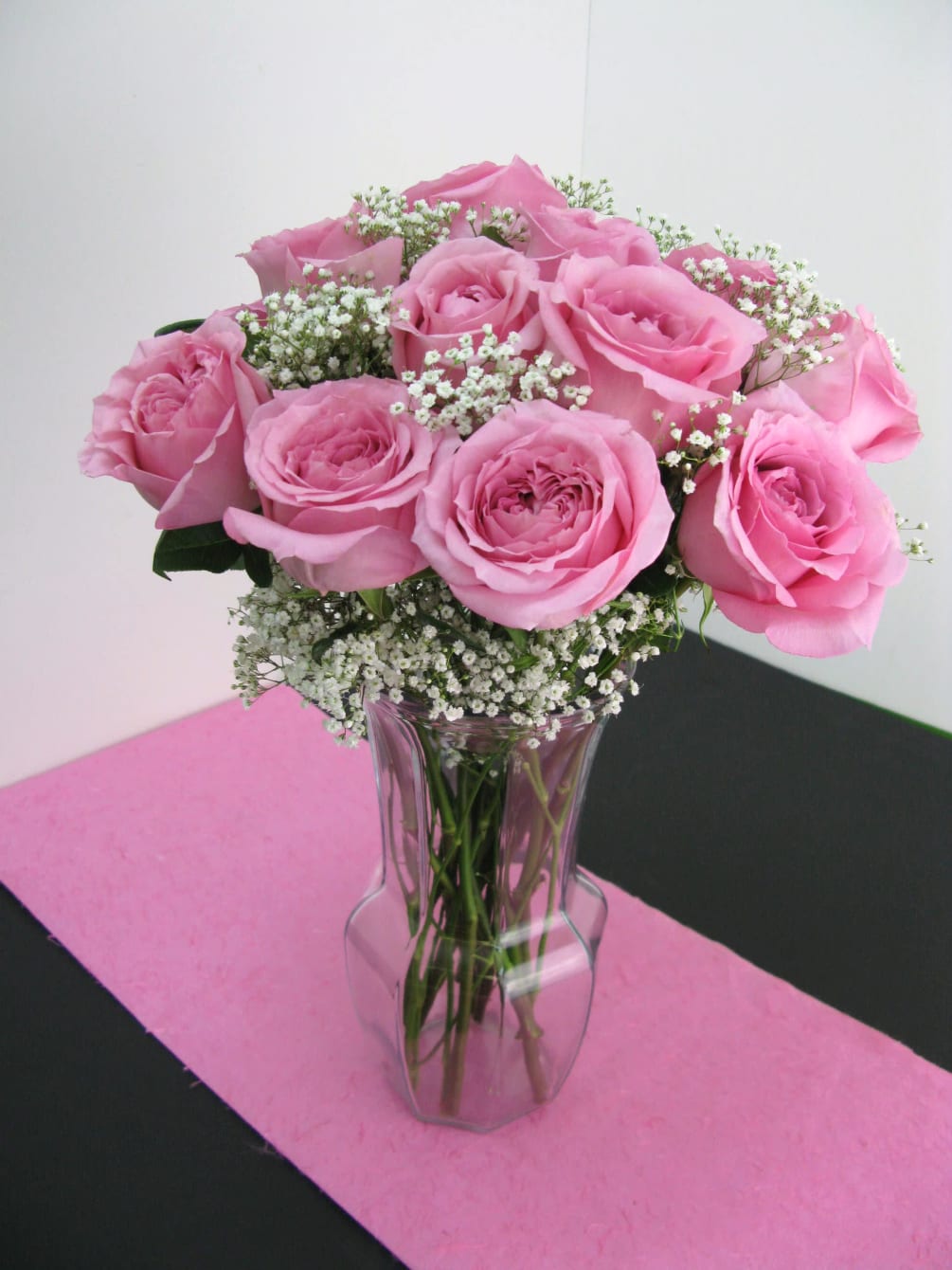 Here we have a simple yet exquisite arrangement of a dozen pink