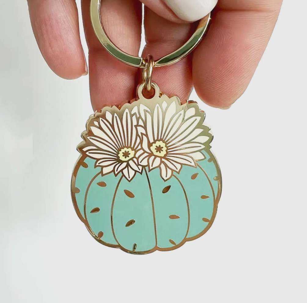 This 18k gold plated enamel keychain is a lovely addition to any