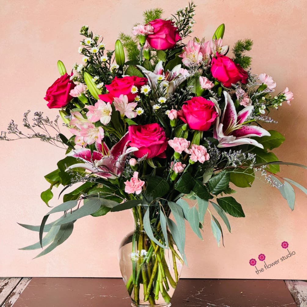 A pink flower arrangement for a special person would typically feature a