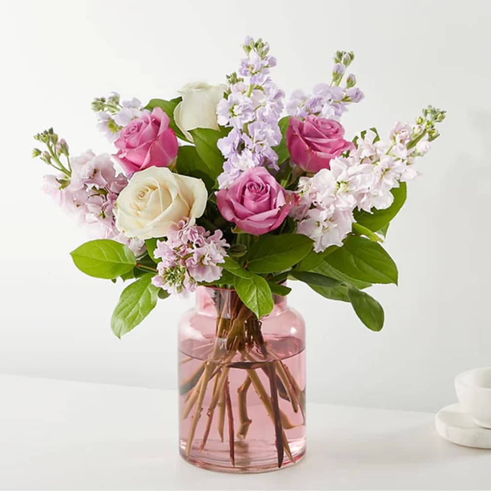 Radiating with soft elegance, this bouquet captures the essence of a dreamy