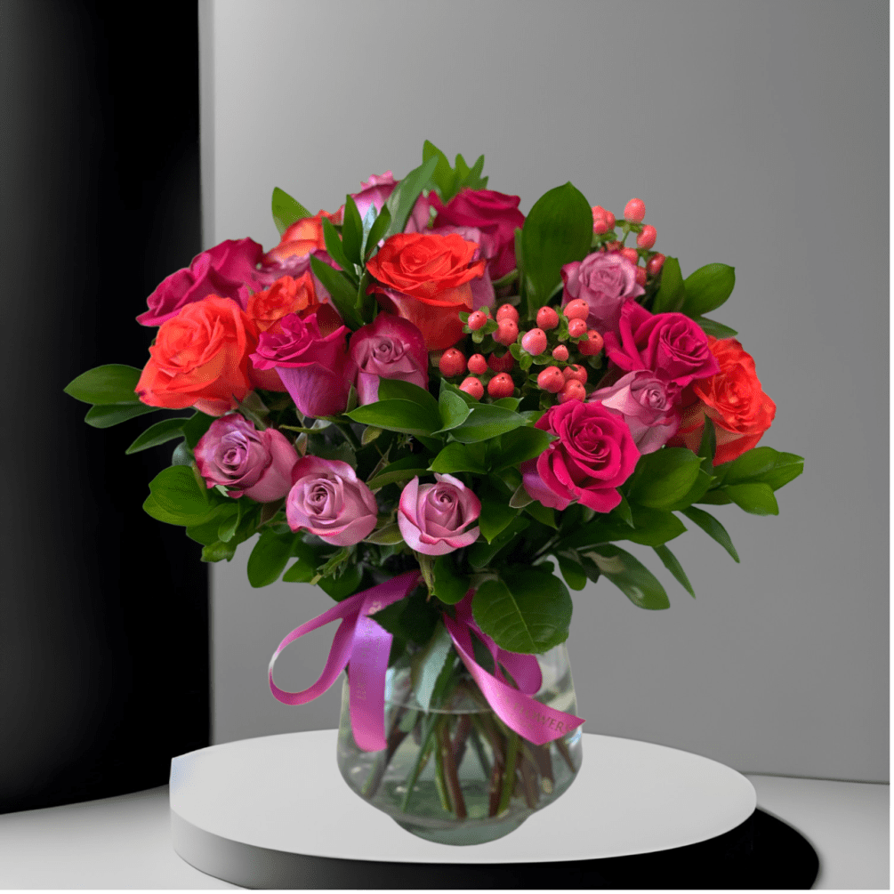 A lovely bowl of colorful roses brightens and lifts any room (and