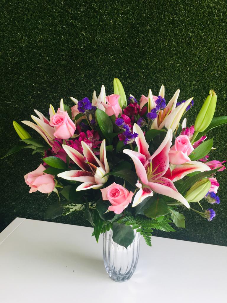 An amazing combination with Stargazer Lilies, Pink Roses, Alstroemeria, and some greenery!
Picture