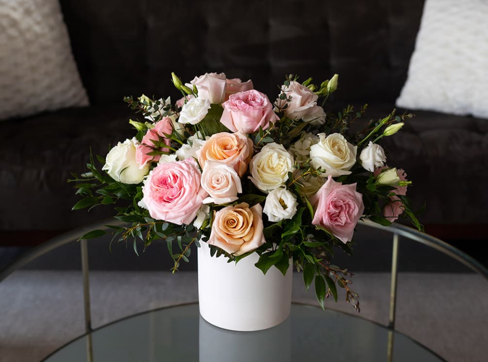 Shades of pink, soft peach and ivory reminiscent of a vintage English