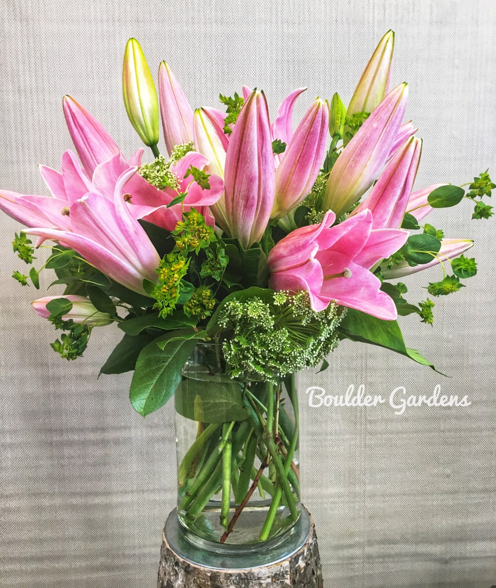 A gorgeous choice filled with pink, white or assorted fragrant Oriental Lilies