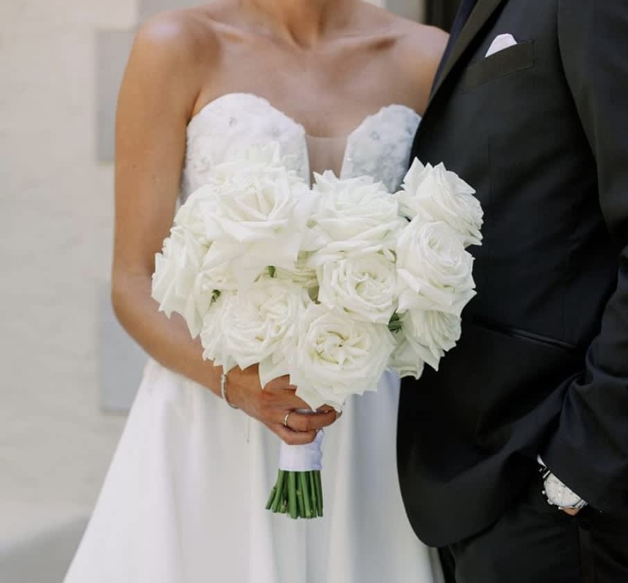 Beautiful White Garden Rose hand-tied Bridal Bouquet.
Contact us for a quote!