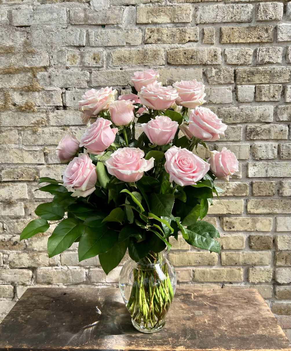 18 Beautiful Pink Roses in a Clear Glass Vase. 
With Their Soft