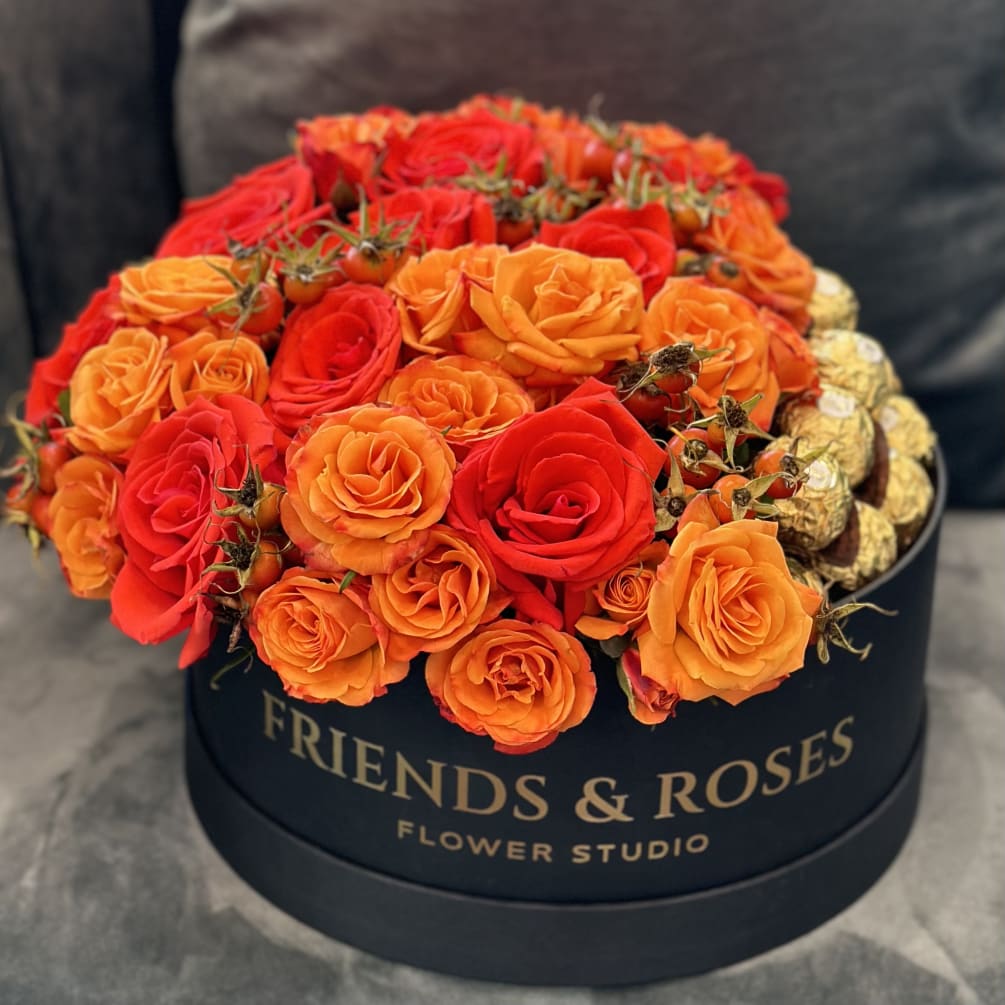 Fall inspired flower mix with Ferrero Rocher chocolates.