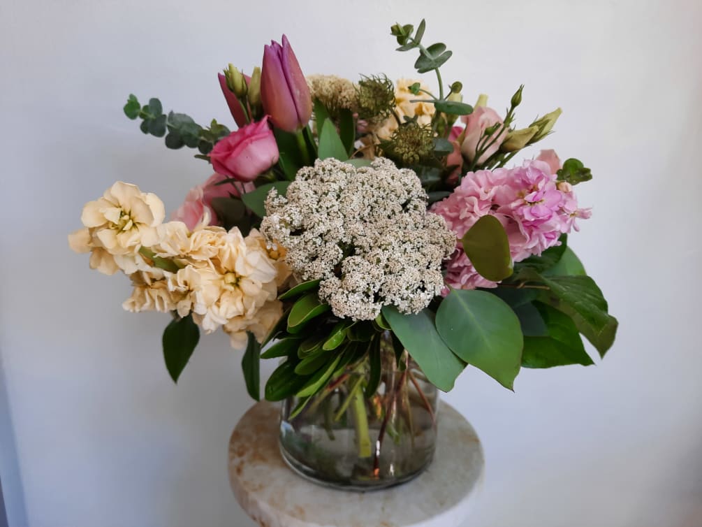 Queen Anne&#039;s Lace, Stock, Tulips, and Lisianthus elegantly assembled, perfect for any
