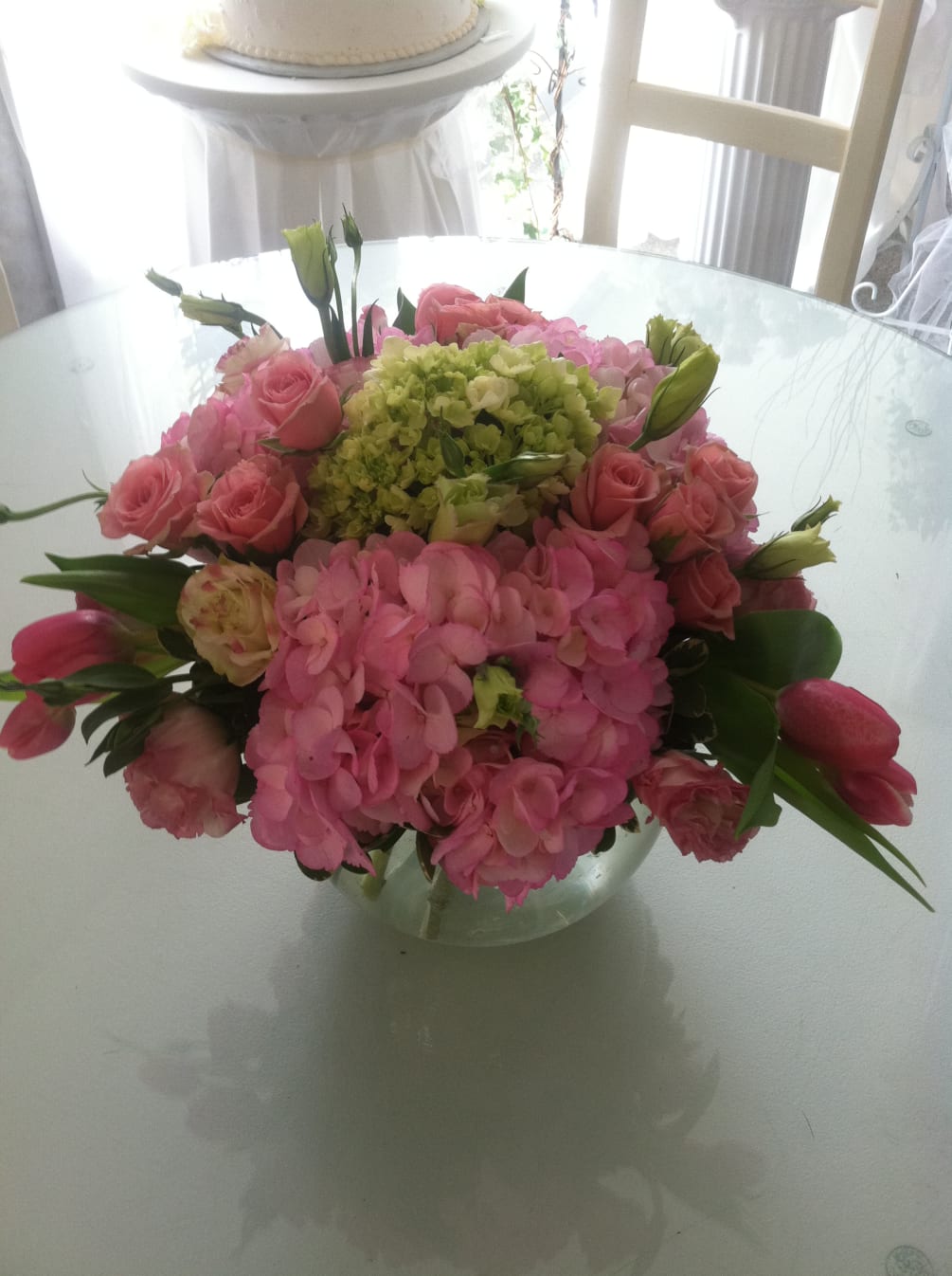 A gorgeous mix of pinks and greens hand-designed in a clear glass