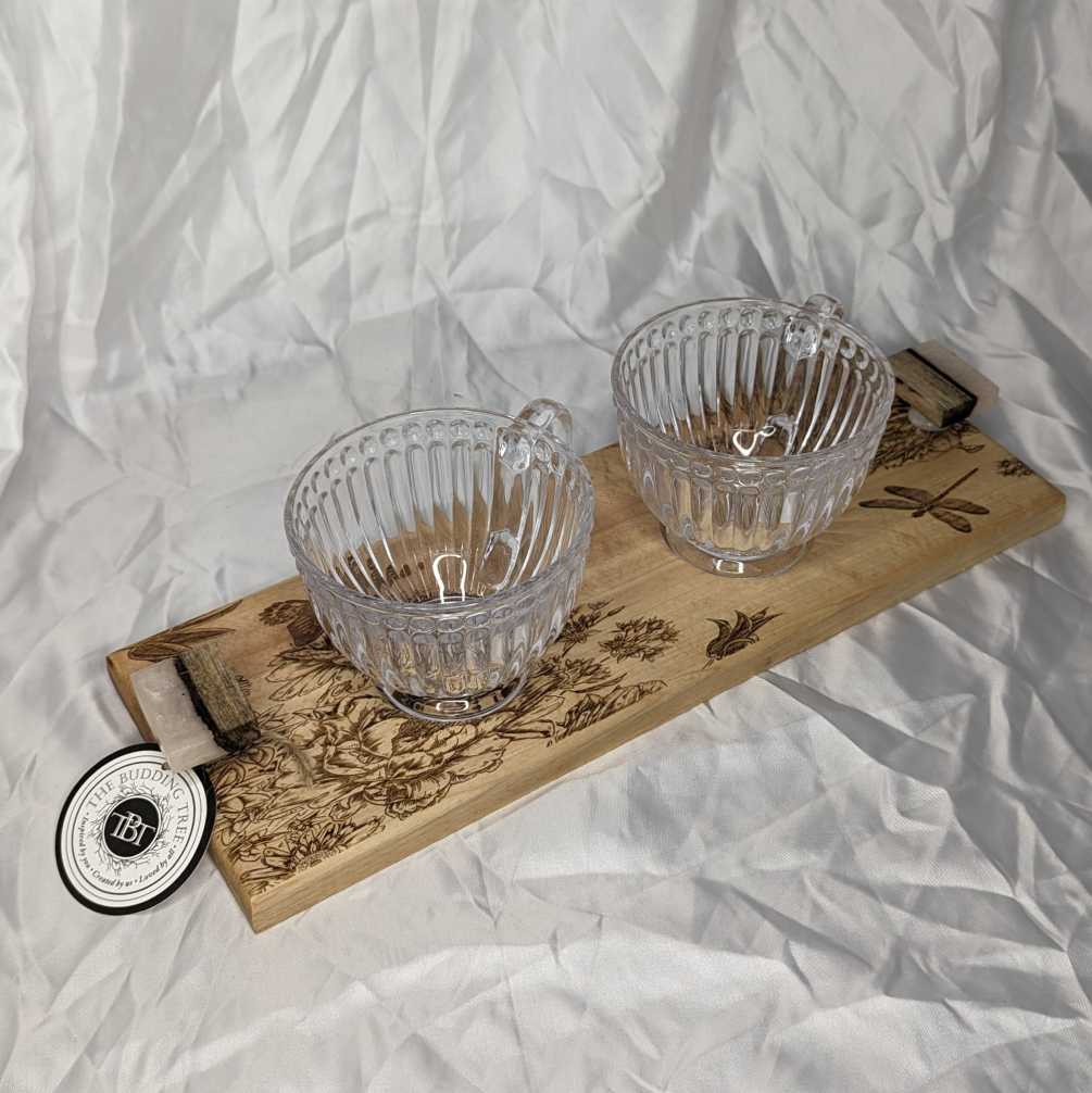 This petite, artisan-made tray features delicate handles and comes with two glass