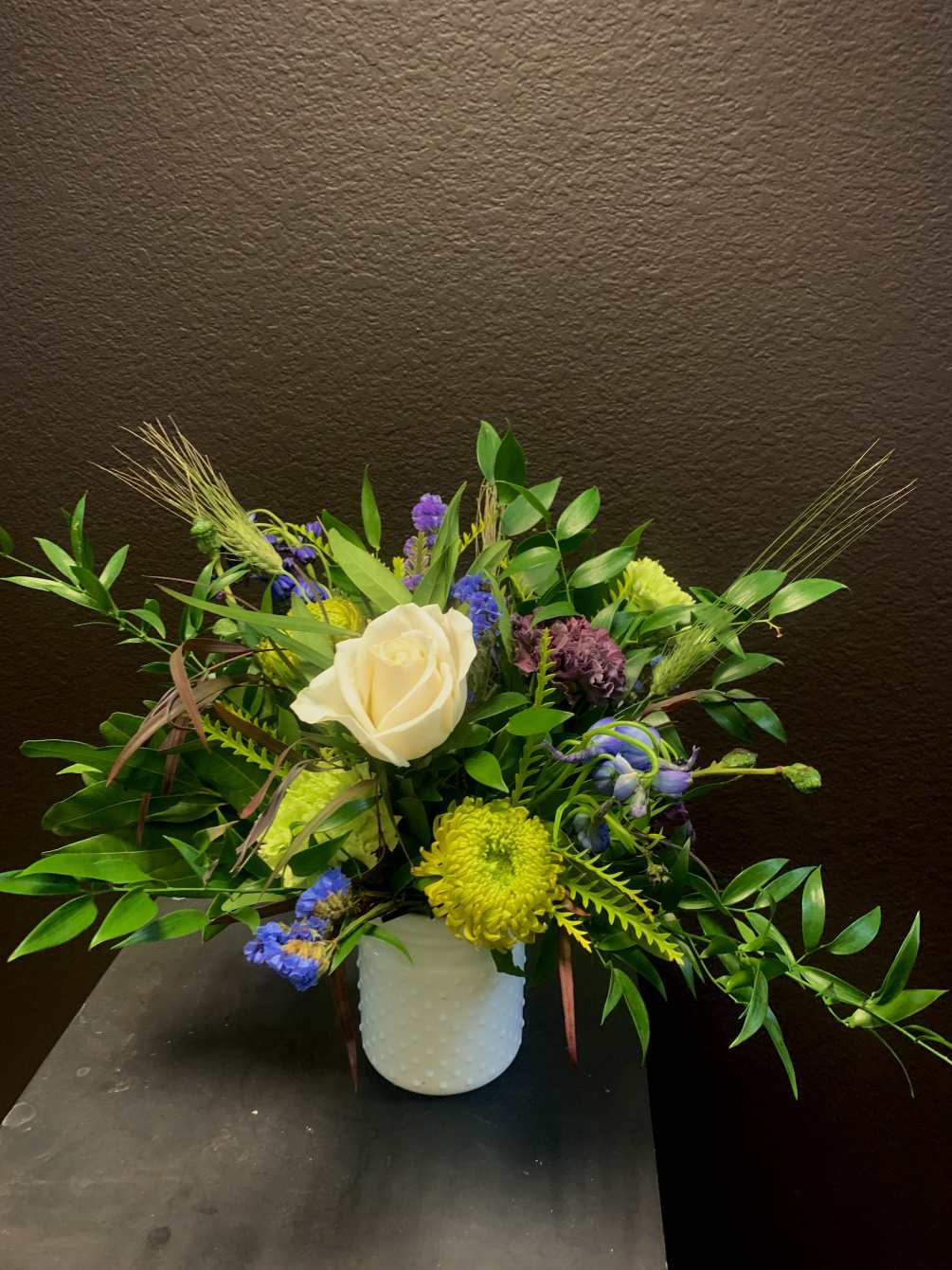 This floral arrangement is crafted to bring joy and warmth with its