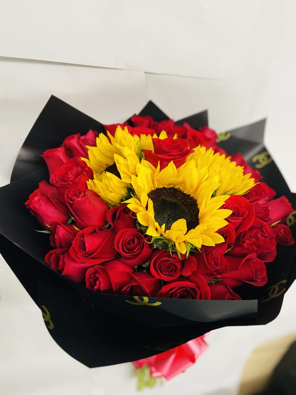 4 Dozen Red Roses and 5 sunflowers