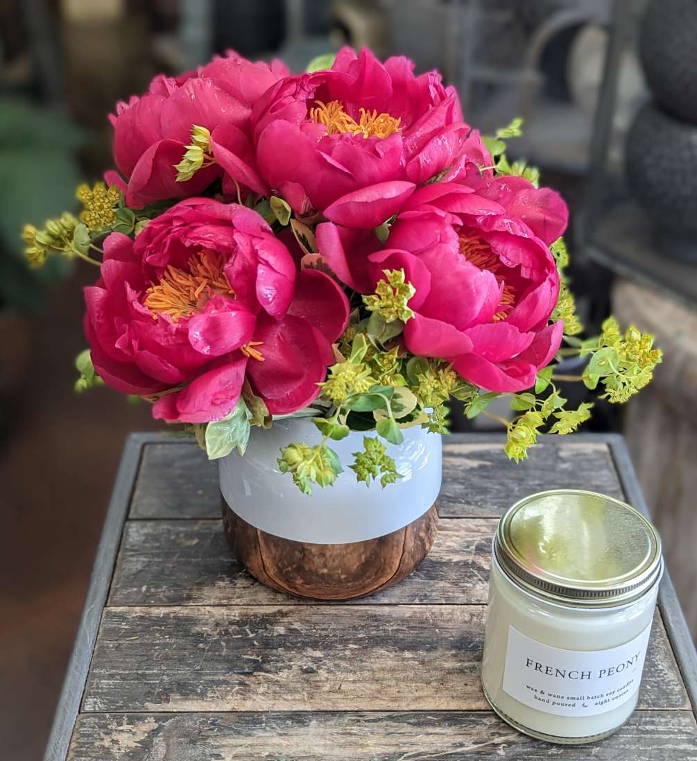 Beautiful seasonal peonies in a petite white and rose gold vessel. The