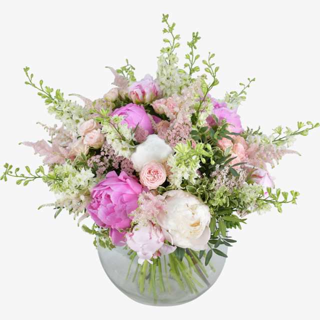 Irresistible pink and white peonies,soft and sumptuous with a hint of retro