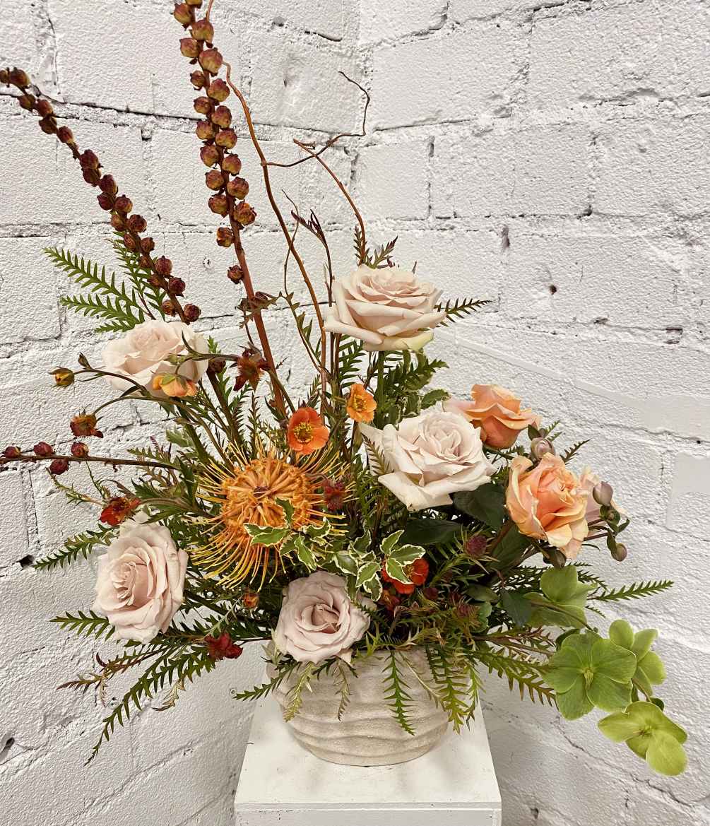 Modern, earthy, warm and exotic floral arrangements.