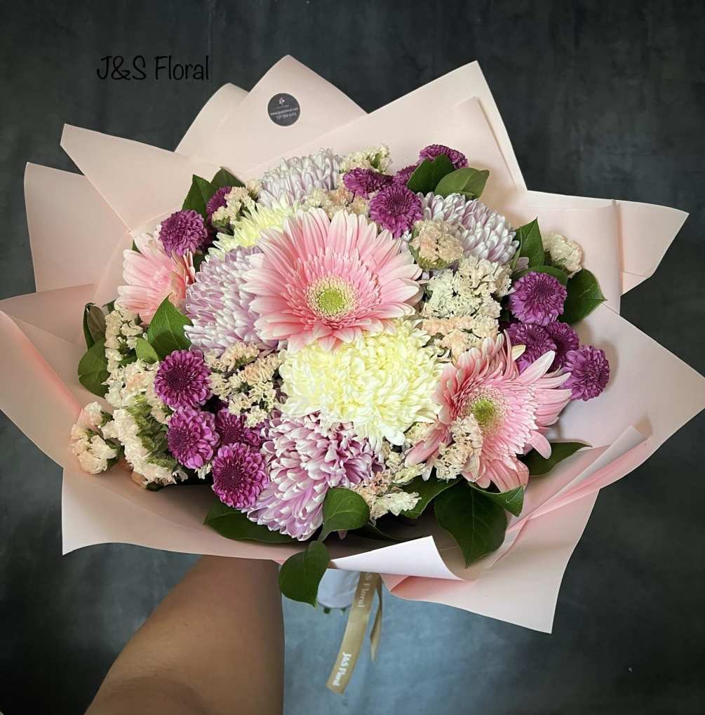 Introducing Our beautiful Bouquet the beauty dream. Beautifully designed with Gerbera, mums