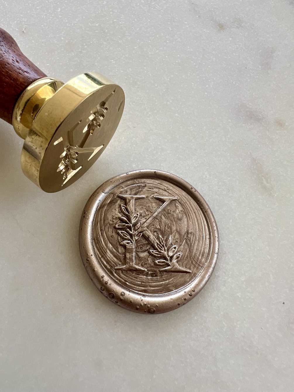 Elevate your flower arrangement and notecard with a personalized initial wax seal
