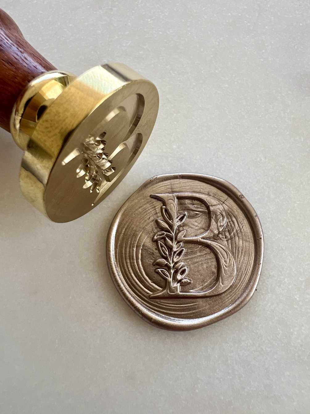 Elevate your flower arrangement and notecard with a personalized initial wax seal