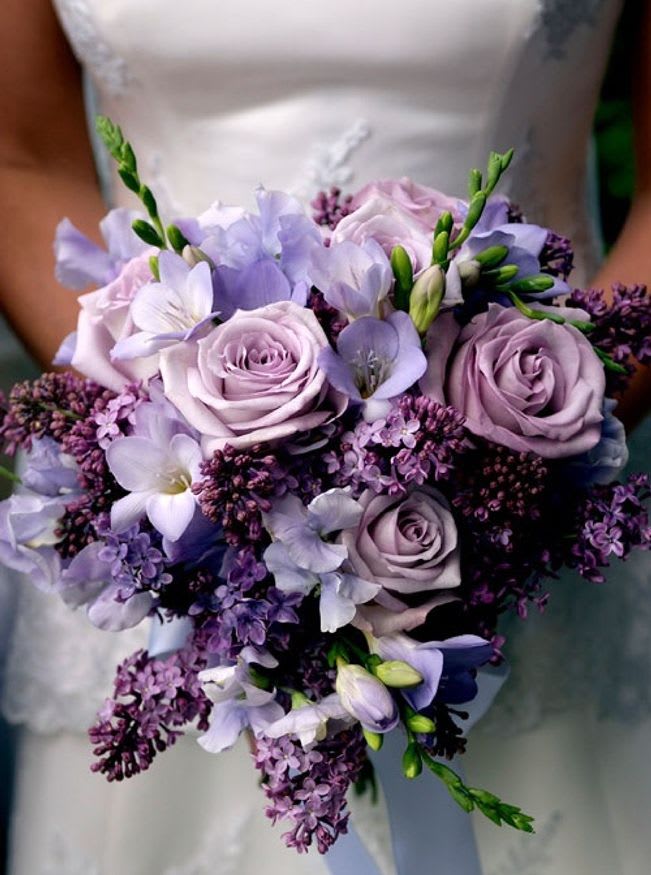 The purples and lavender combination in this bouquet is stunning.
This bouquet style