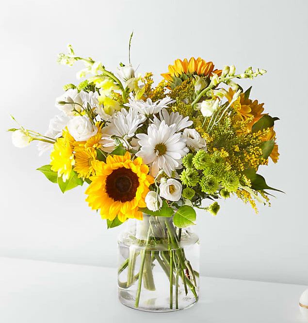 Give a dose of sunshine in bloom. This stunning bouquet is teeming