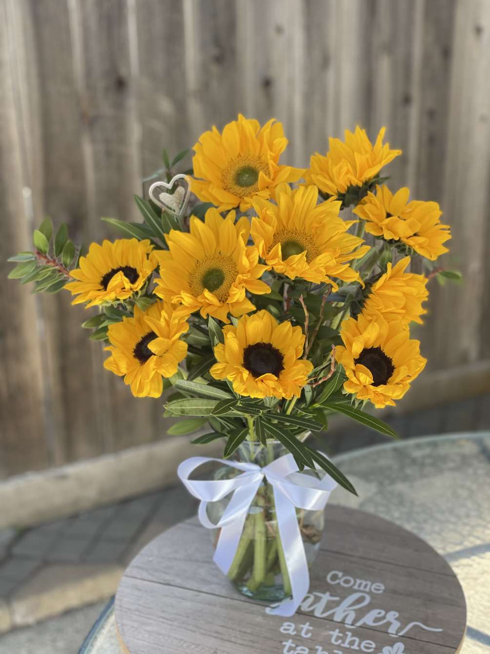 8-12 Sunflowers in a vase glass with white ribbon