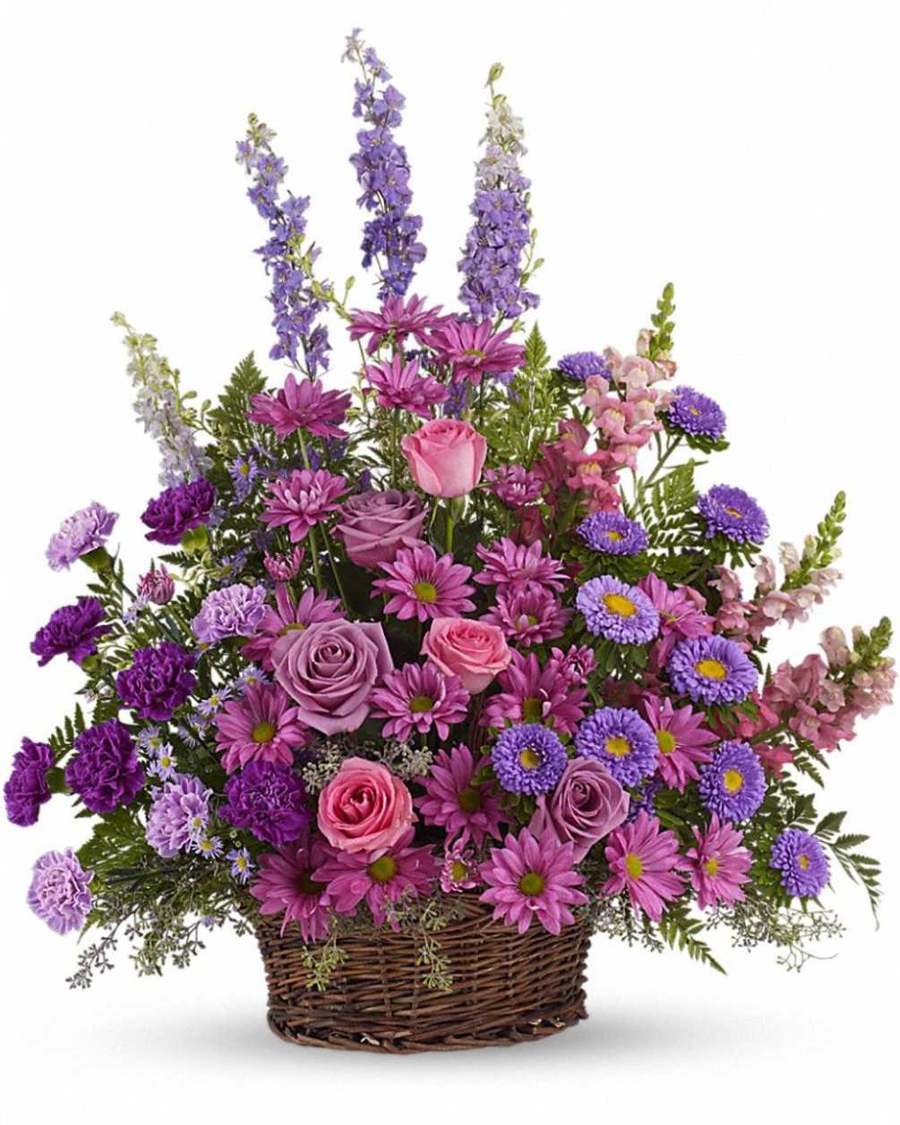 Lavender sympathy basket made of Carnations, Roses, Asters and Larkspur.