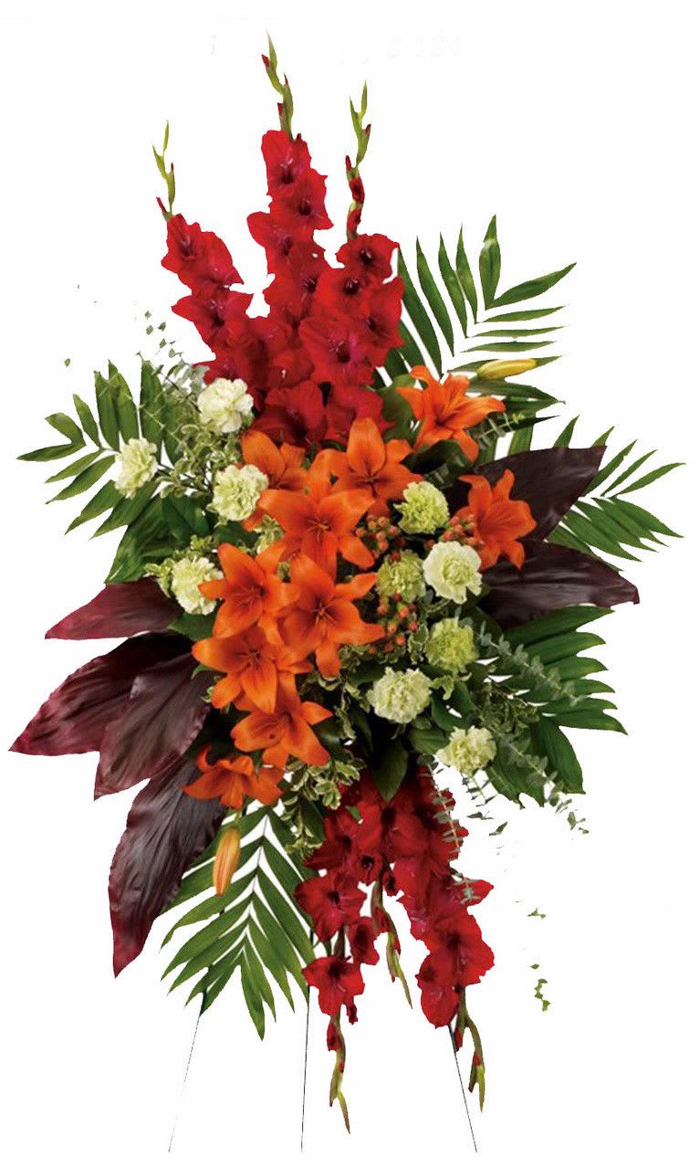 Artistic standing spray made with Glads, Lilies, Carnations and Exotic foliage.