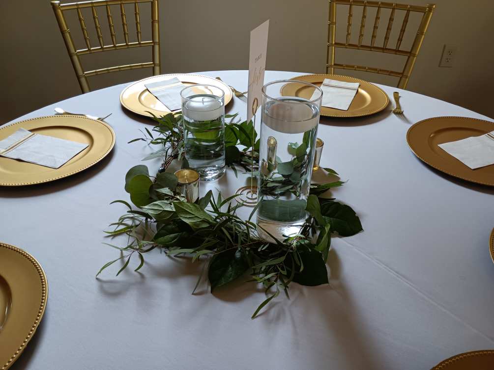 Julie's wedding reception table greenery wreath by Elena's Flowers