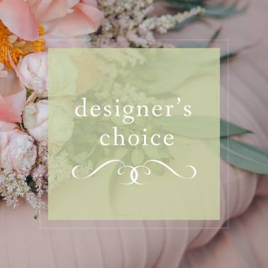 Designer’s choice floral arrangement with pale pink blooms