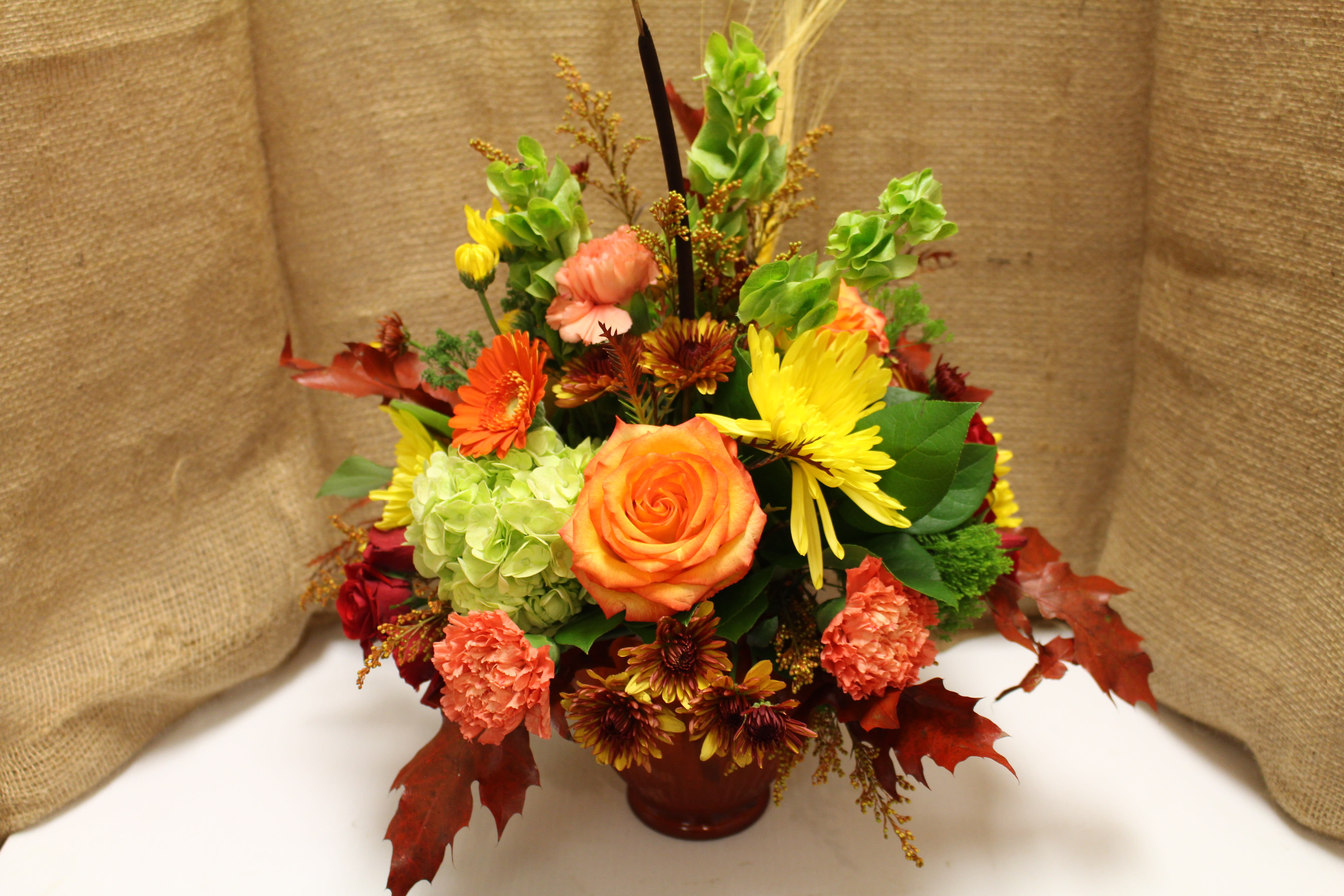 autumn cache vase in Stoneham, MA Evergreen Florist Inc.