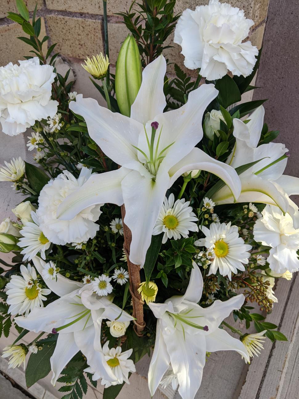 Serene White Lily Basket in Stanley, WI Ele's Flowers