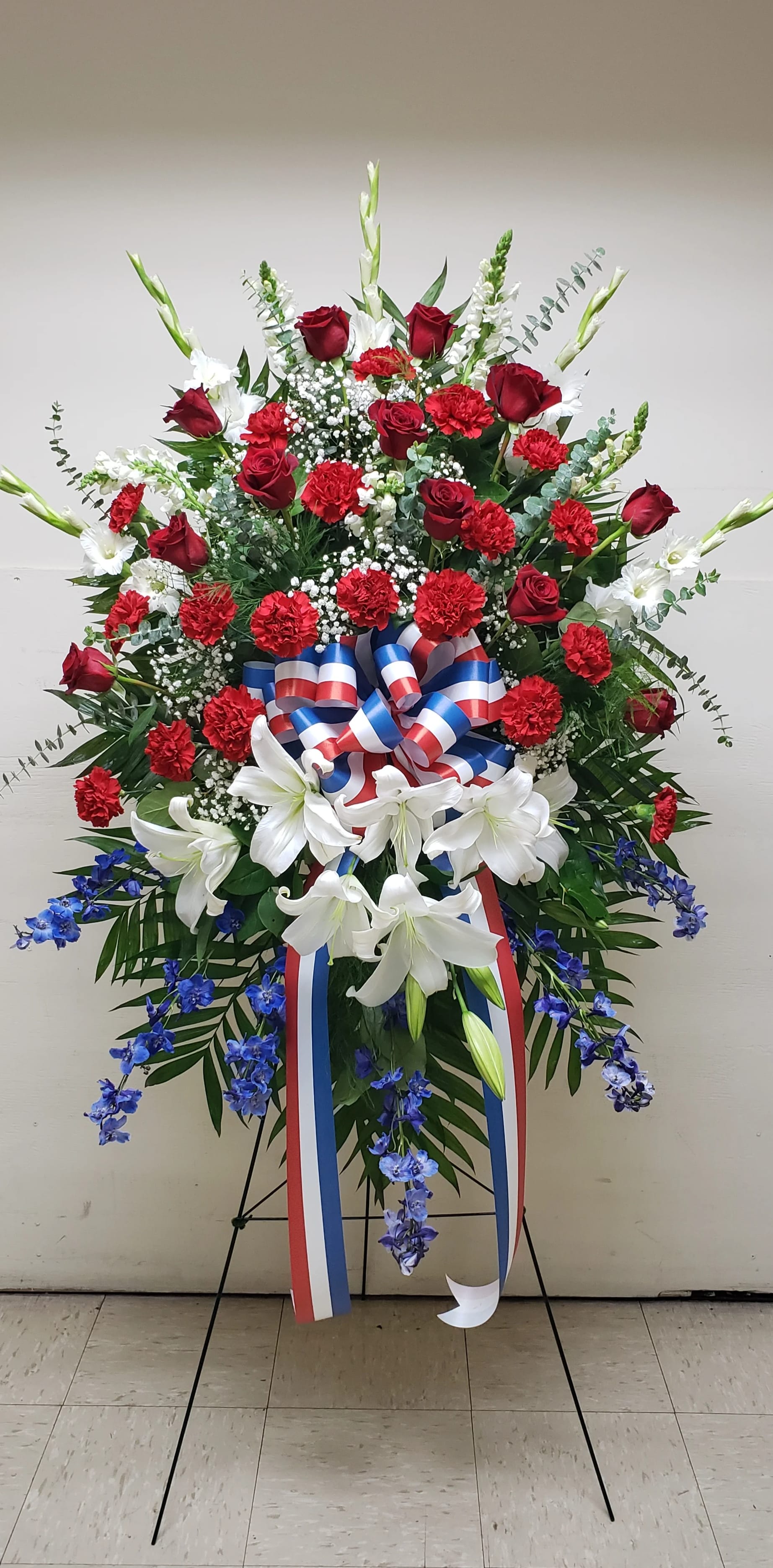 DUTY HONOR COUNTRY SPRAY WITH 12 RED ROSES Twin Towers Florist