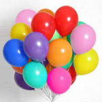 Cluster of colorful balloons on white strings
