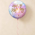 Round birthday balloon with pastel colors and a curling ribbon