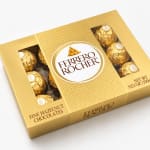 Box of Ferrero Rocher hazelnut chocolates in gold packaging