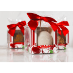 Gift boxes with red bows and wrapped treats inside