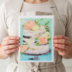 Greeting card with a painted tiered cake and flowers