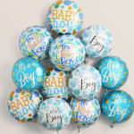 Cluster of blue and white baby boy balloons with printed messages