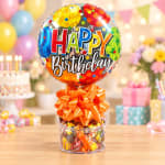 Birthday balloon with candy in a clear container and orange bow