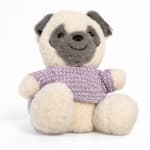 Plush pug wearing a lavender sweater on a white background