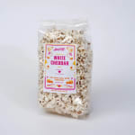 Bag of white cheddar popcorn in clear packaging