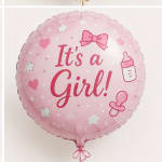 Pink round balloon reading "It's a Girl!" with baby icons