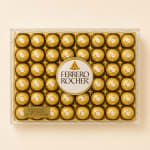 Box of Ferrero Rocher chocolates in gold wrappers