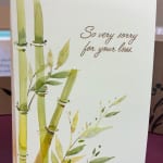 Sympathy gift card with bamboo and leaves and the message "So very sorry for your loss."