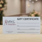 Gift certificate card from LaPier's Flowers & Gifts on a table