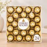 Box of Ferrero Rocher chocolates in gold wrappers