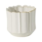 White scalloped ceramic vase with gold trim on a plain background