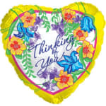 Heart-shaped balloon with flowers and the words "Thinking of You"