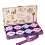 Boxed set of lavender shower steamers with a purple ribbon
